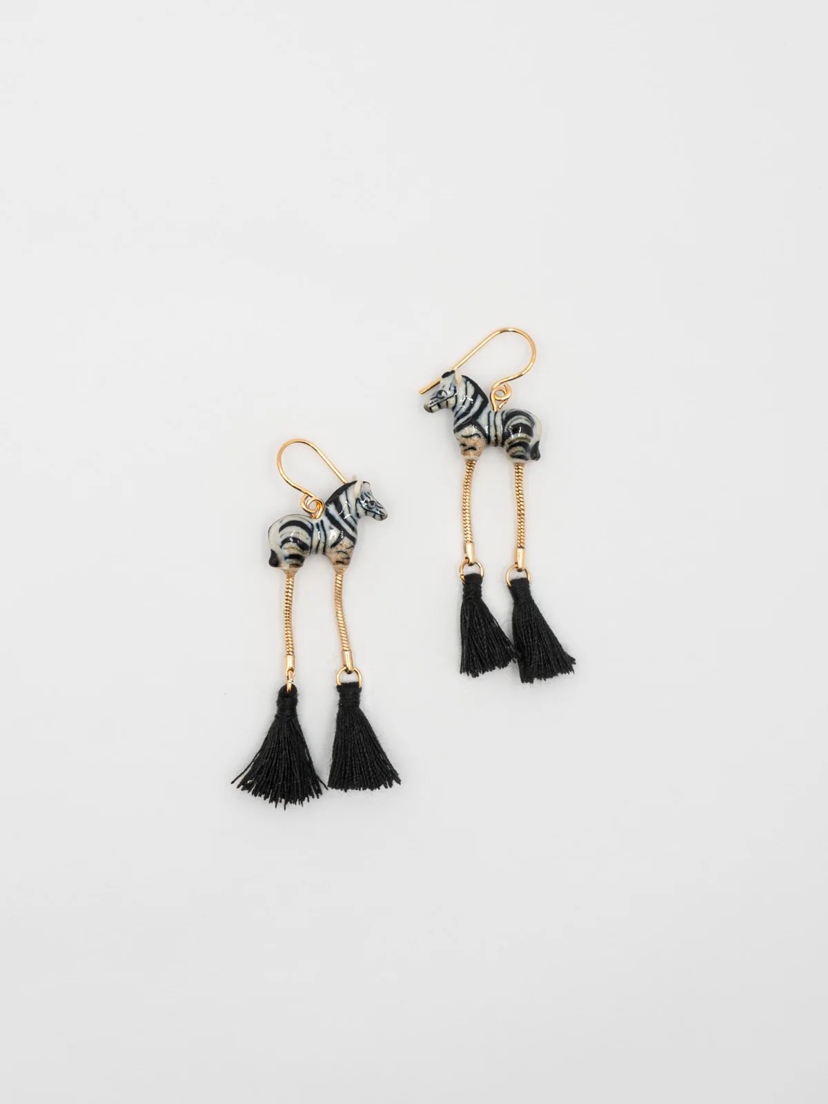 Boucles d'oreilles zèbre avec pompons