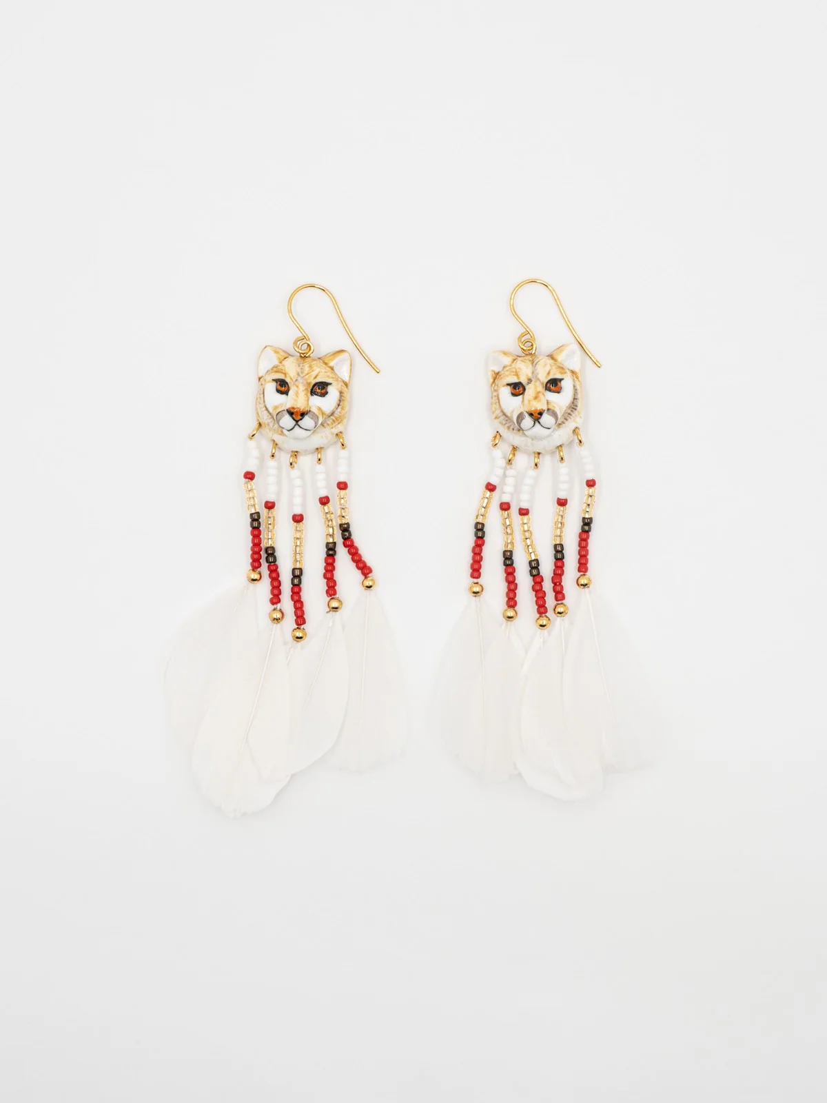 Boucles d'oreilles puma avec perles & plumes