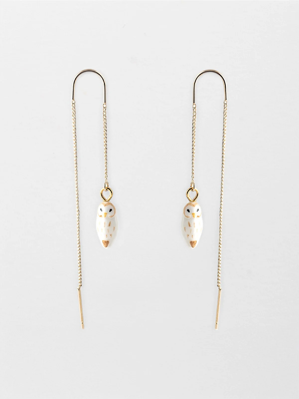Longues boucles d'oreilles chouette blanche