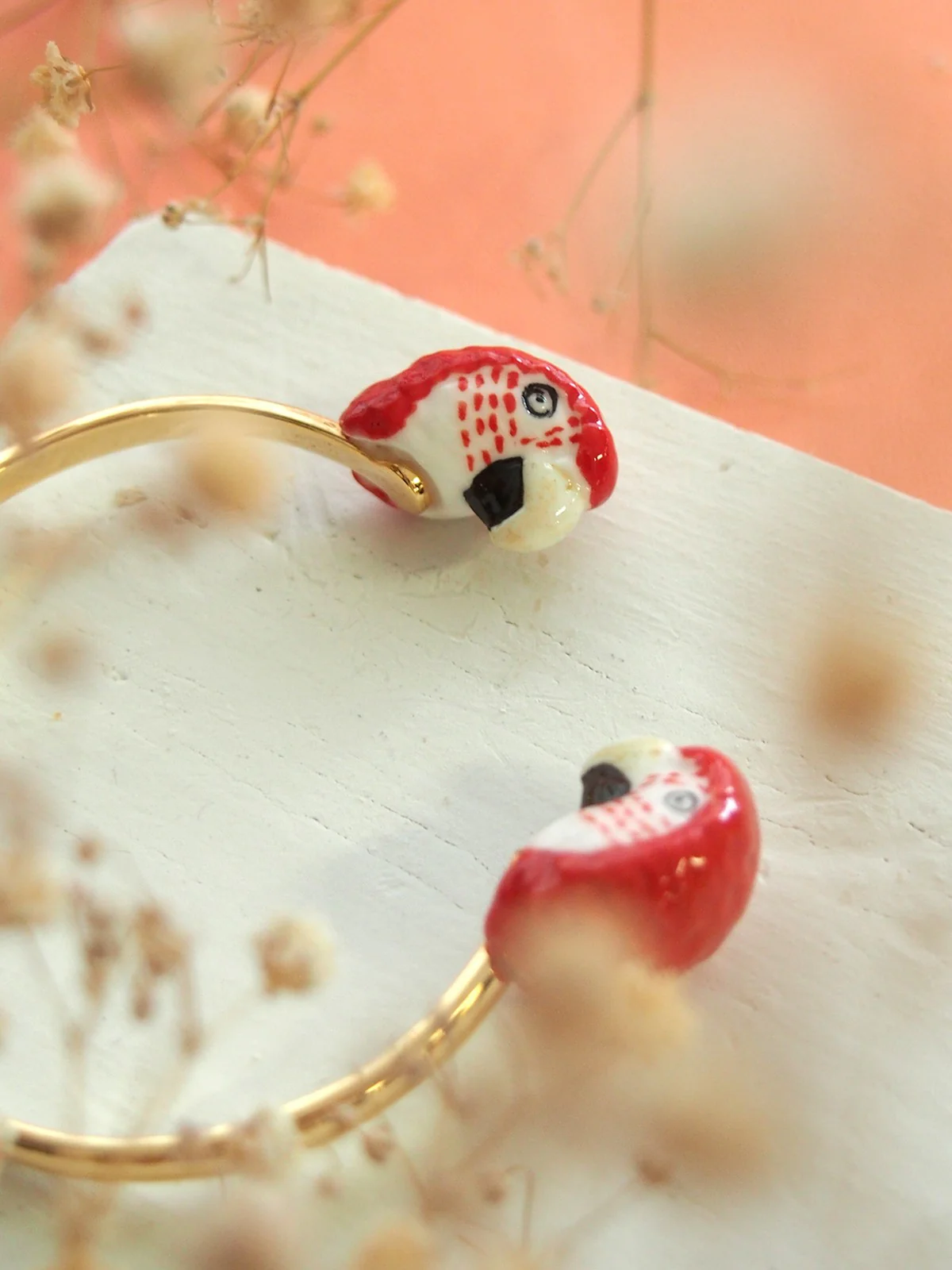 Bracelet FaceToFace perroquet rouge