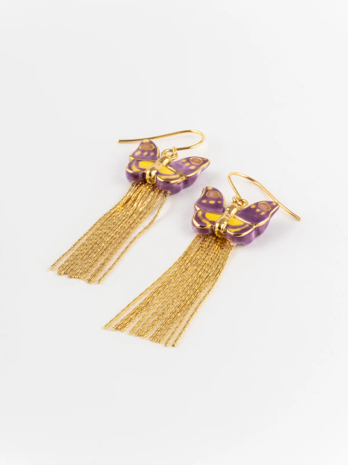 Boucles d'oreilles papillon violet à franges