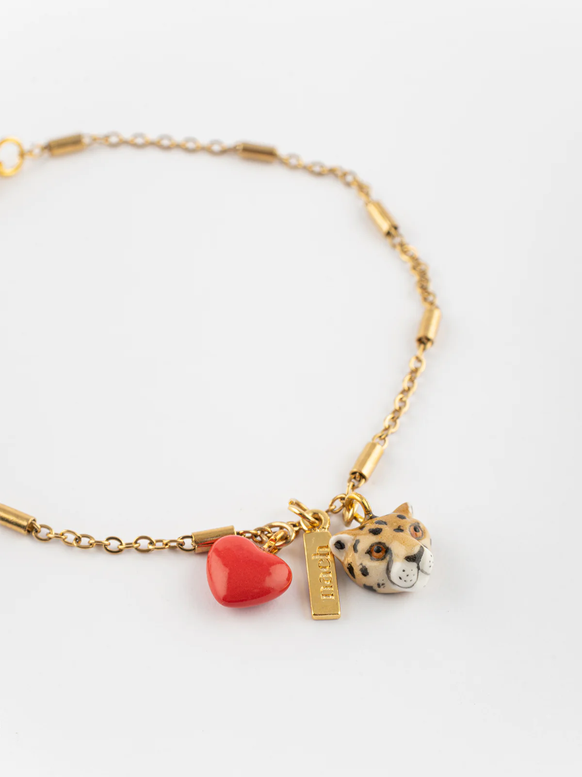 Bracelet chaîne léopard et cœur