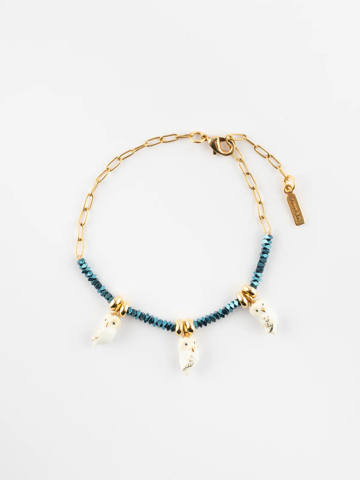 Bracelet en perles d'hématite et chouettes