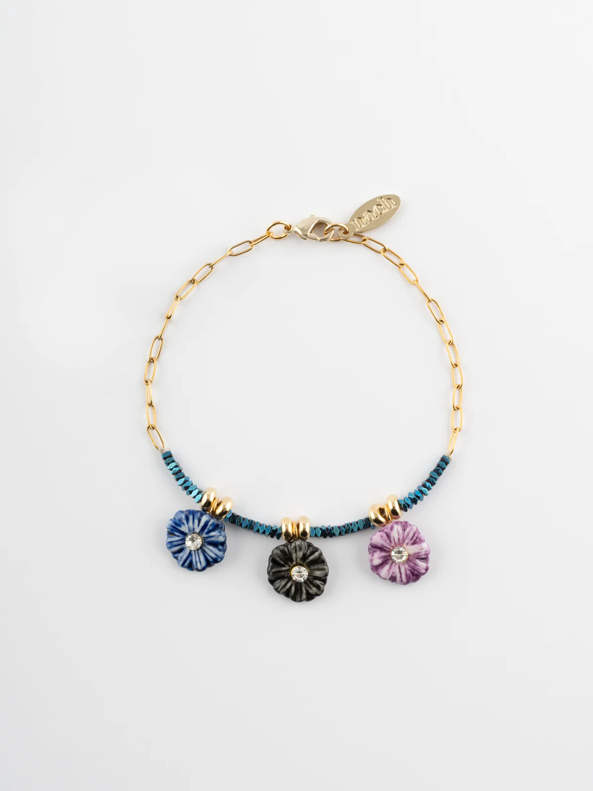 Bracelet en perles d'hématite et chardons