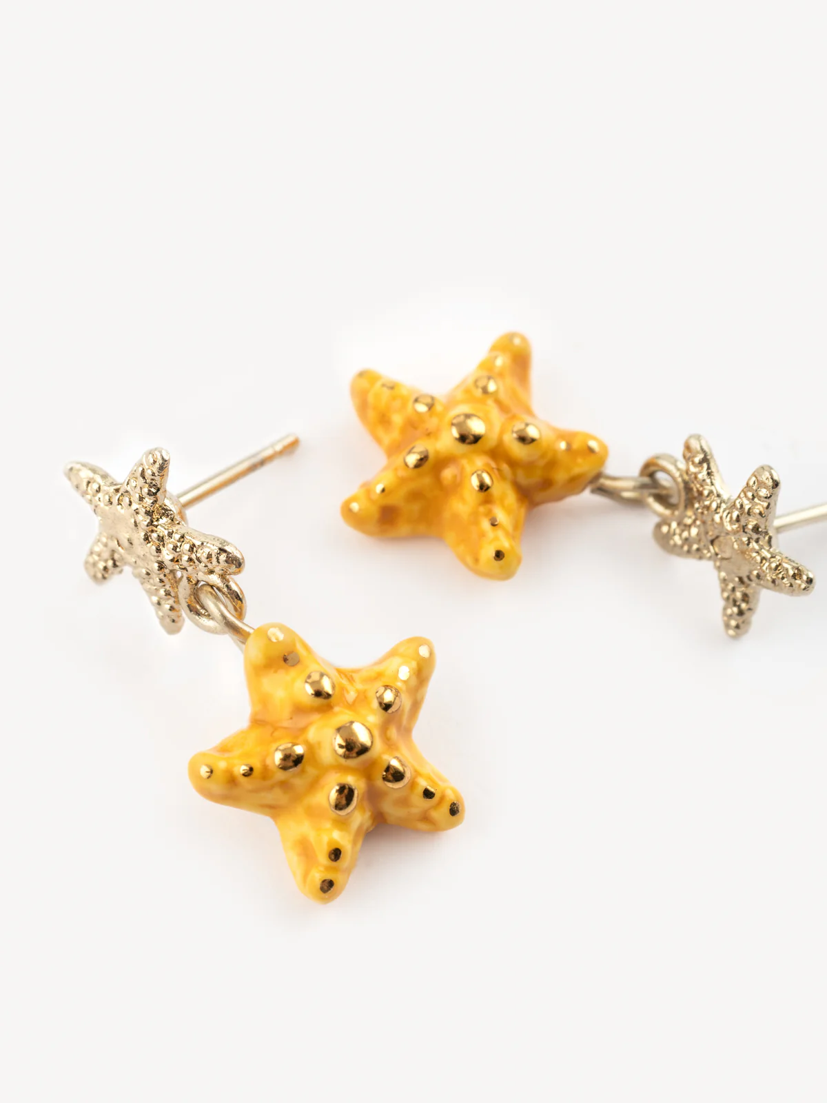 Boucles d'oreilles pendantes étoile de mer jaune
