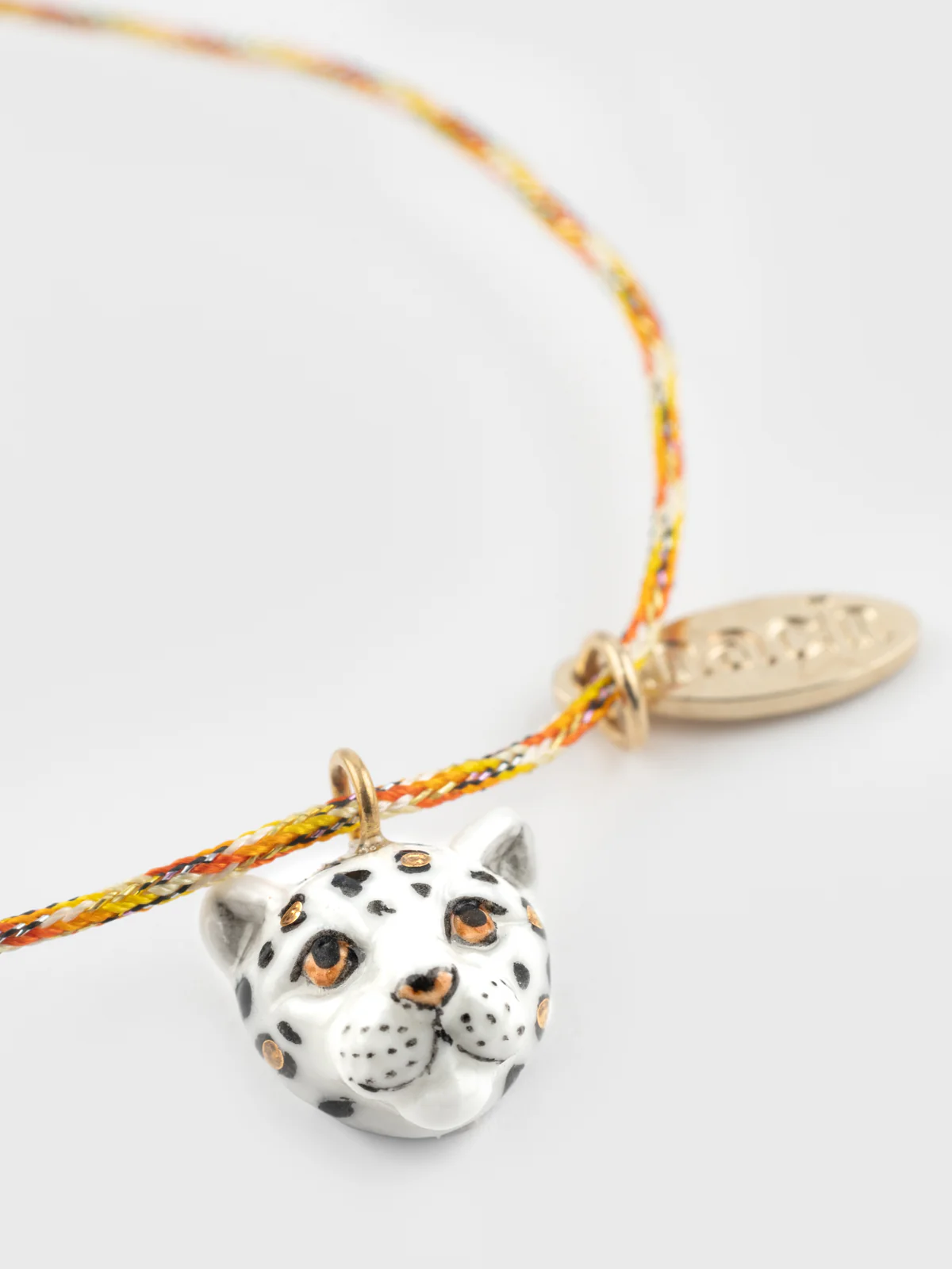 Bracelet cordon léopard blanc et doré - Image 3