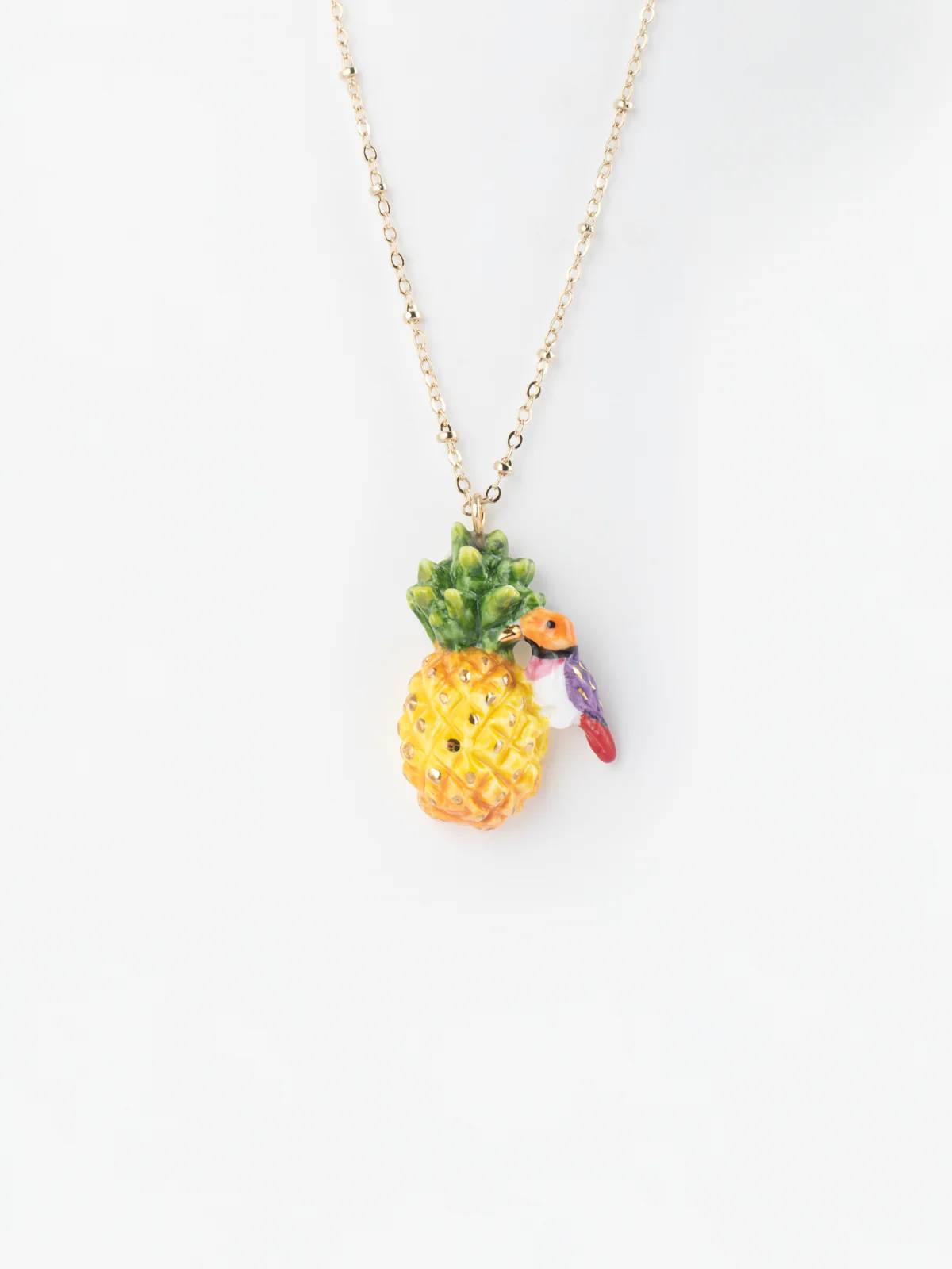 Collier ananas et oiseau diamant de Gould