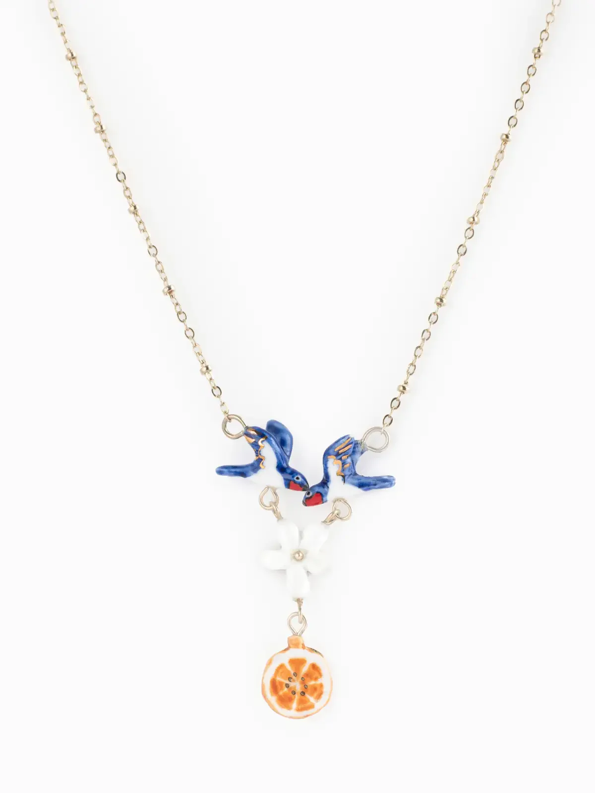 Collier couple d’hirondelles, fleur et orange